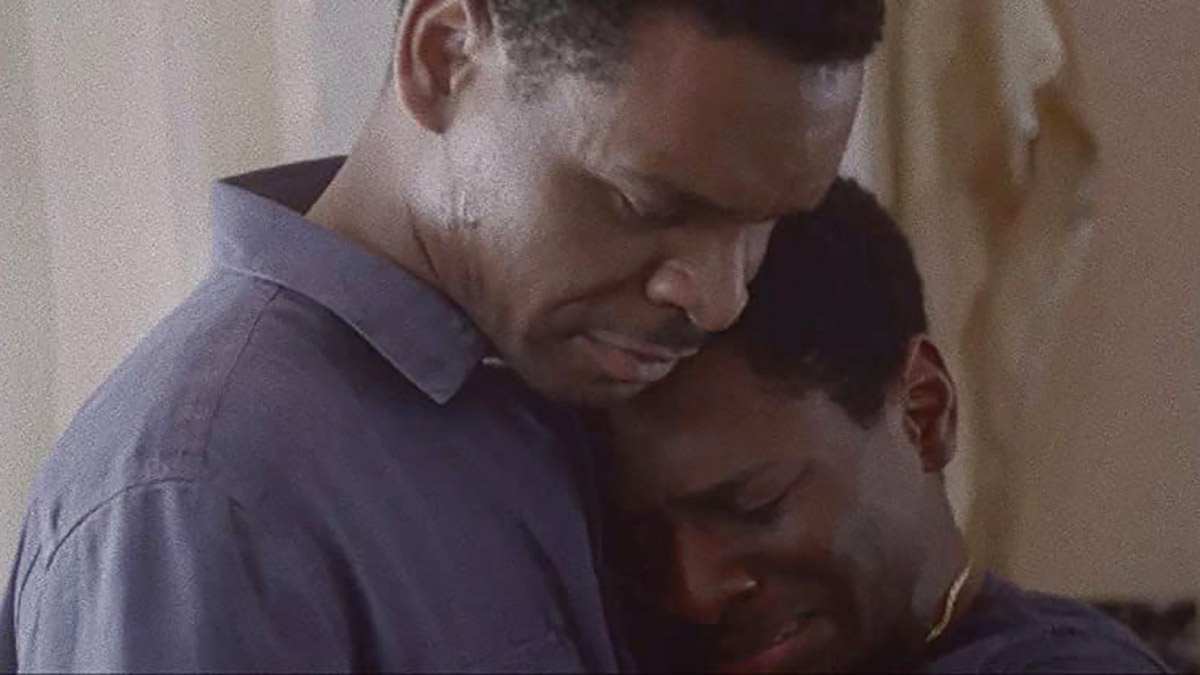 Still from "Beautiful Nightmare" by Kevin Lee Maxwell showing Kelechi Antwone Hugging. SFDFF 2021